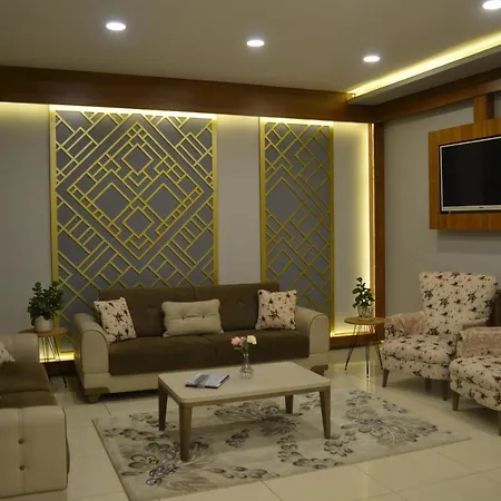 Almasa Aparts شقة *